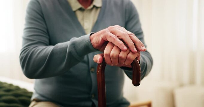 Hands, old man and relax in home with walking stick, mobility support and recovery from injury. Rest, house and senior person with disability, muscle stiffness and stability from parkinson disease