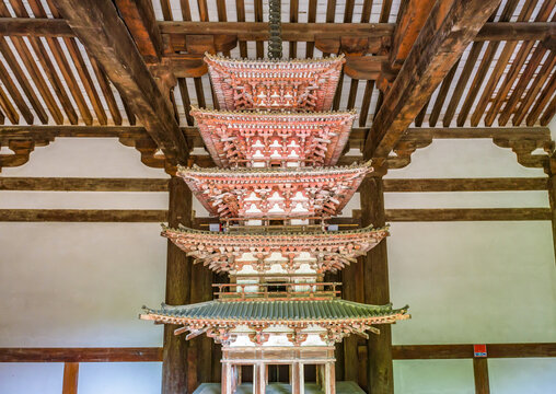 The National Treasure Five-Story Miniature Pagoda inside the main hall of Kairyuoji Temple in Nara