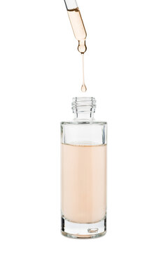 Cosmetic serum gel bottle with dropper, isolated on white background.