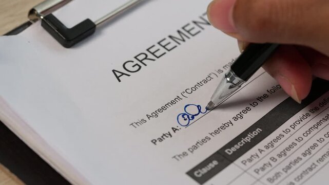 Business Professional Signing Legal Contract for Corporate Agreement and Compliance