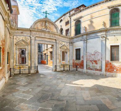 Amazing  cityscape of Venice with narrow canals, boats and gondolas and bridges with traditional buildings.