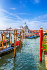 Remarkable morning cityscape of Venice with famous Canal Grande and Basilica di Santa Maria della Salute church. © pilat666