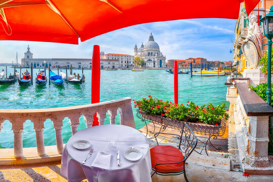 Remarkable  morning cityscape of Venice with famous Canal Grande and Basilica di Santa Maria della Salute church.