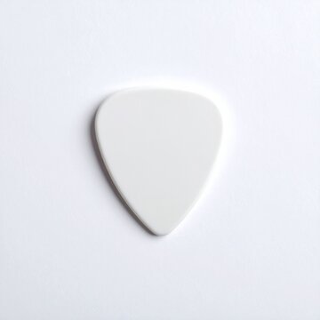 image of guitar pick on white background