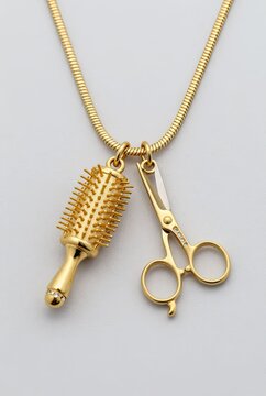 Gold necklace with hairbrush and scissors pendants
