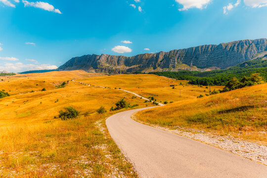 Majestic limestone cliffs of Mount Lebrsnik on the border of Bosnia and Herzegovina and Montenegro, scenic mountain landscape in the Dinaric Alps.