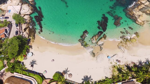 Wonderful aerial top-down view of the stunning conchas chinas beach in puerto vallarta, mexico