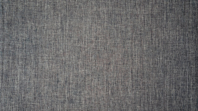 Elegant dark gray linen fabric texture with natural weave, high resolution textile background for interior design, home decor, clothing photography, and artistic product displays.