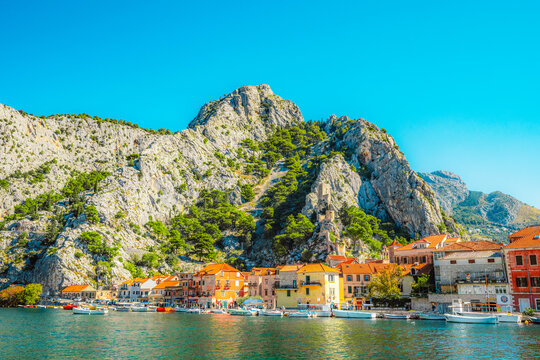 Omis old town and the Adriatic sea from the historic Mirabella fortress, terracotta roofs and the Cetina river in Croatia.