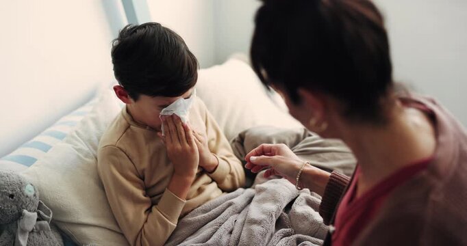 Mother, bedroom and sick child with tissue for blowing nose, flu or sinus problem and help in family home. Girl kid, ill son and woman with support for allergies, recovery or healing in house