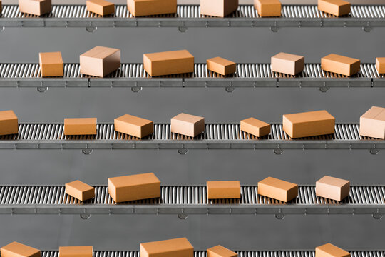 3D parallel package conveyor moving boxes in ordered rows