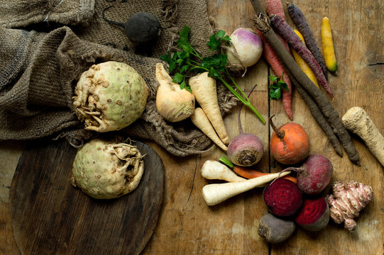 Winter vegetables on rustic wooden background