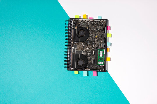 Innovative motherboard notebook with bookmarks on split background