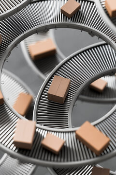 3D spiral parcel routing through looping roller conveyors