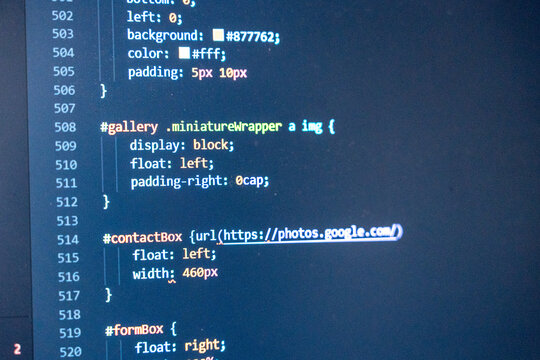 Close-up view of css code on a monitor, showing styling rules for web elements