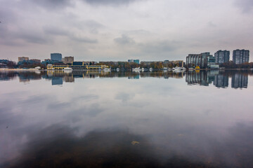 Fototapeta premium Overcast Autumn Reflection on Khimki Reservoir, Northern Moscow, Russia