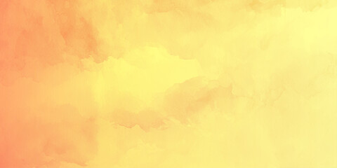 Obraz premium Soft orange and yellow watercolor paint splash background on paper. creative design projects and artistic,