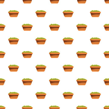 Wicker baskets holding green vegetables forming a seamless repeating pattern on white background