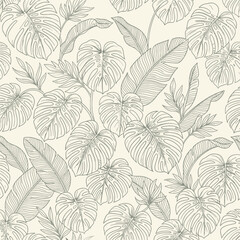 Fototapeta premium A seamless pattern featuring detailed hand drawn tropical foliage leaves