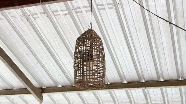 Vintage lamp made from traditional fish trap