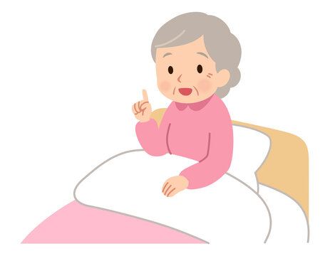 ベッドに座る高齢女性　話す　表情