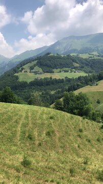 Beautiful View of Zambla Alta Mountain Village from Zambla Bassa During a Sunny Summer Day. Oltre il Colle, Bergamo Province, Italian Alps