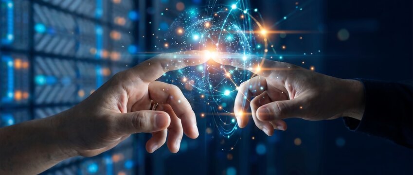 Closeup of two hands touching a glowing digital sphere representing global network connectivity, data processing, and artificial intelligence in a hightech server room environment