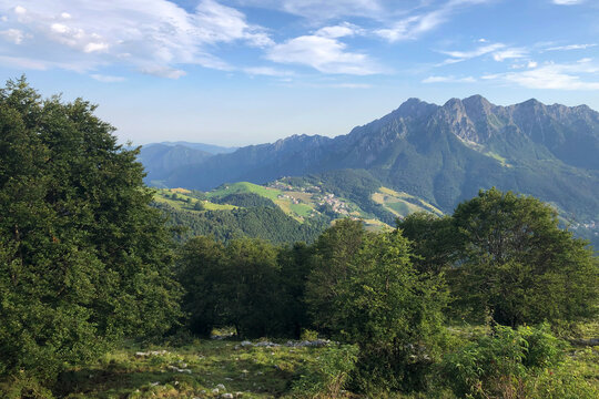Beautiful View of Zambla Alta Mountain Pass in Serina Valley from Mount Arera, Italian Alps, During a Sunny Summer Late Afternoon. Oltre il Colle, Bergamo Province, Italy