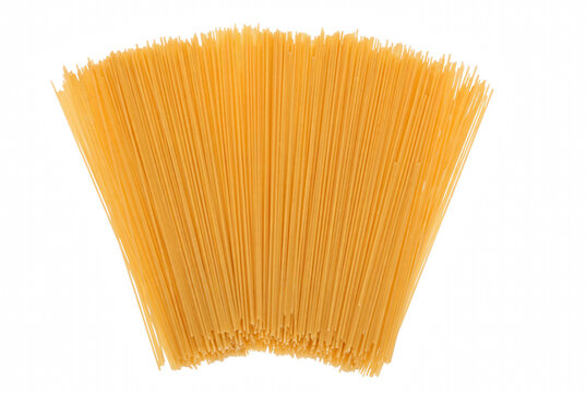 Fan of Dry Spaghetti Noodles Isolated on Dark Surface