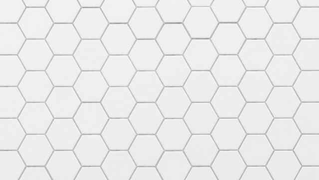 White hexagonal tile pattern with subtle grey grout creating a geometric honeycomb texture