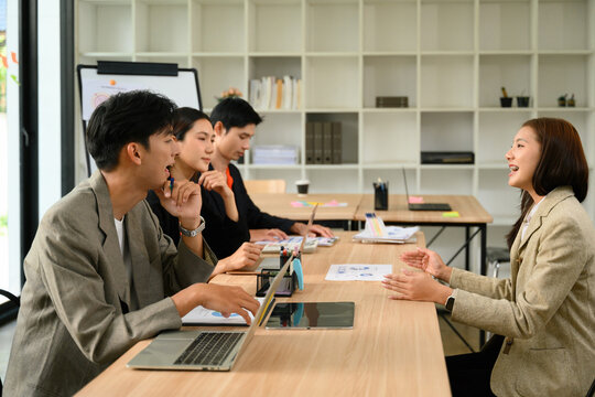 Executive Board Conducting New Employee Interview with Asian Business Professionals in Modern Office