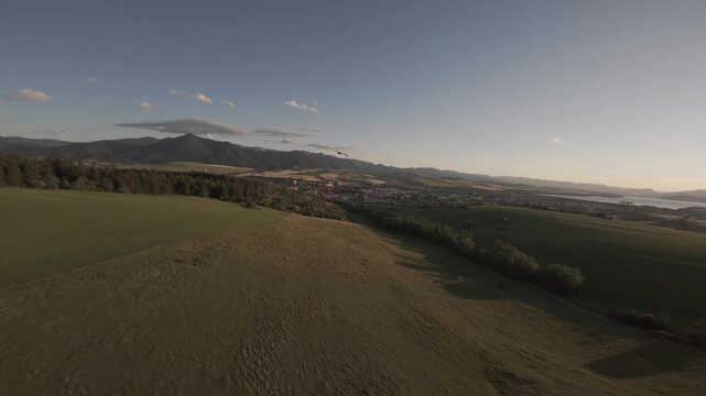 Hawk Flying in Scenic Golden Hour Sunset Over Rural Landscape, 4K FPV D-Log M