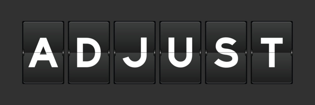 Black color analog flip board with word adjust on gray background