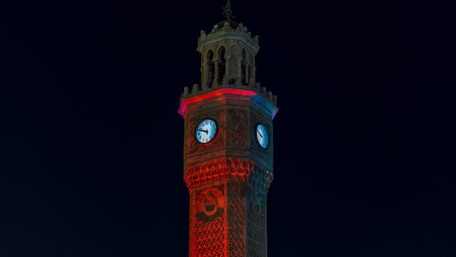 Izmir, Turkey - September 4, 2025: Night view of the Izmir Clock Tower in Konak Square, Izmir, Turkey, showing the illuminated historic landmark, Ottoman style architecture, clock face, city lights