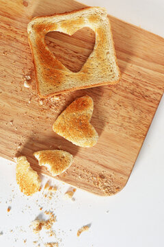 Heart shaped toast on board