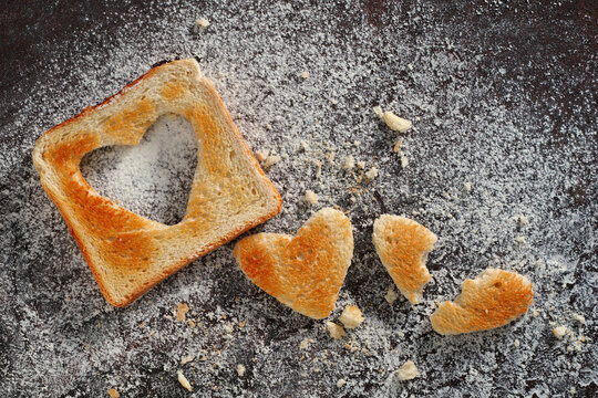 Heart shaped toast with crumbs