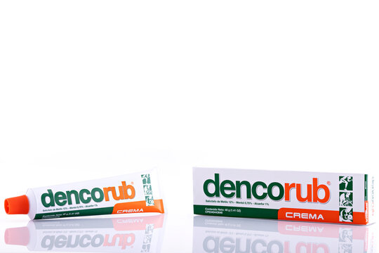 Dencorub Cream Tube and Packaging Isolated on White Background