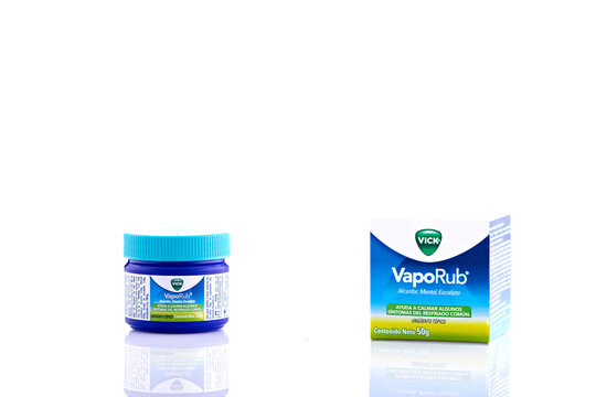 Vicks VapoRub Ointment Jar and Box Isolated on White Background