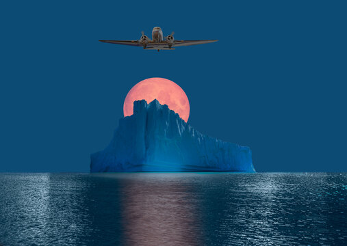 A twin-propeller plane is flying over the sea - Melting icebergs by the coast of Greenland, on a beautiful summer day Full Moon in the background - Melting of a iceberg and pouring water into the sea 