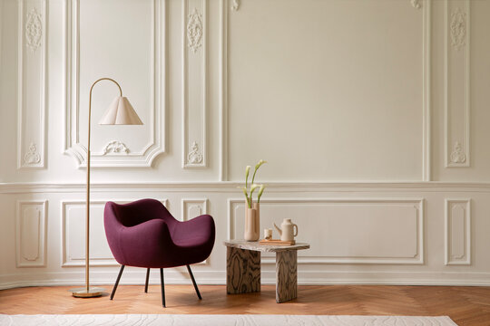 Elegant Living Space with Contemporary Chair, Floor Lamp, and Decorative Table in a Classic Interior