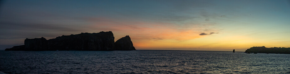 Panorama of sunrise over Nightingale Island in the South Atlantic Ocean © Angela