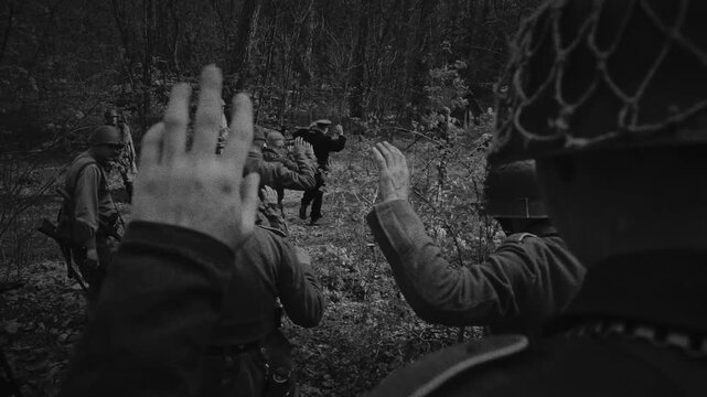 WWII German soldiers surrender to Soviet troops in Eastern Europe forest