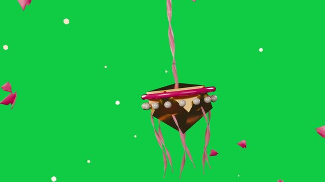 Hanging ornament rotating while petals drifting in, starting ribbons unwinding on transparent bg