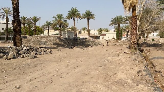 Ancient stone ruins at the historic othman well oasis in Madinah.