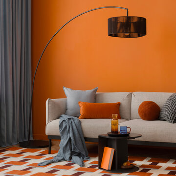 Modern Living Room Interior with Arc Lamp and Orange Accents, Vivid Wall and Contemporary Furniture Design