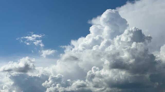 Cumulonimbus incus clouds in the sky.