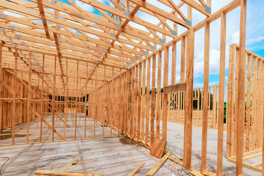 Construction of wooden structure in large open area with beams frames set up