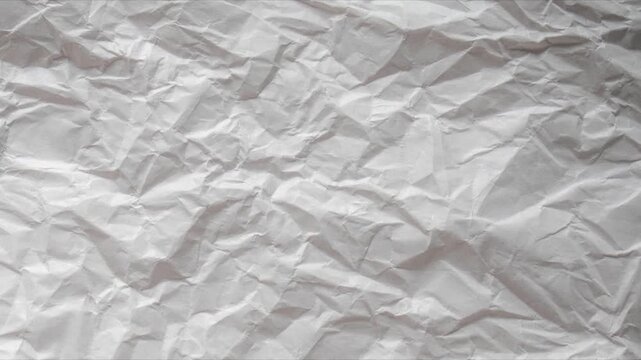 Paper texture background animated. Stop motion animated paper texture background, Crumpled paper abstract shape background with animation. white moving paper texture. Seamless looping in 4k.