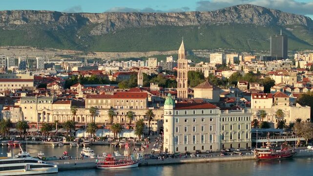 Diocletian's Palace in Split, Aerial drone shot of Old Town and cityscape at sunset time in Split, Croatia