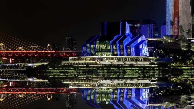 Chongqing cyberpunk city skyline illuminated at night reflected in water